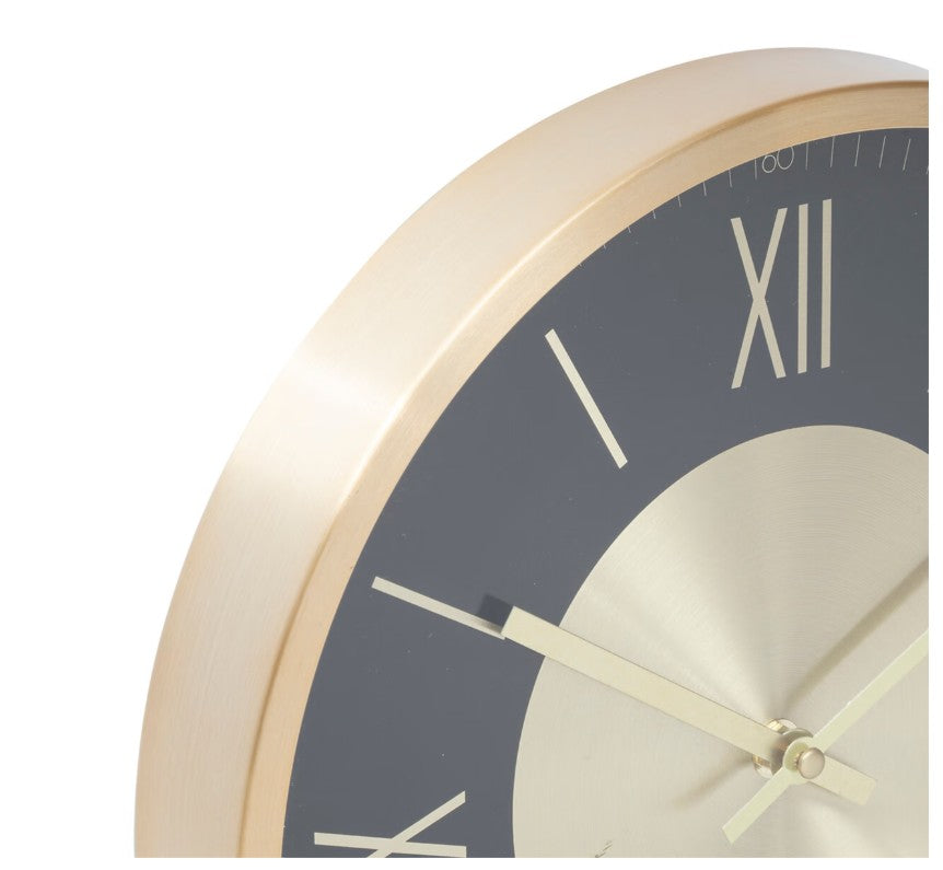 Horloge en métal noir et doré D.30cm